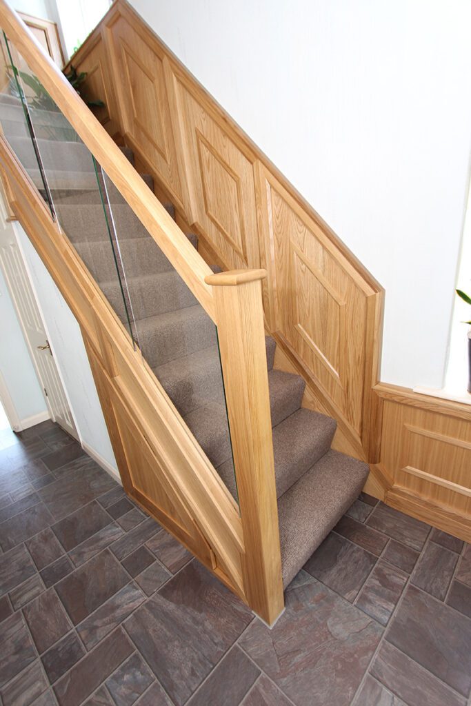 Staircase with wall panelling