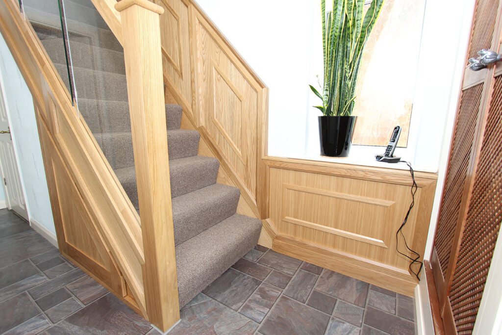 Staircase with wall panelling