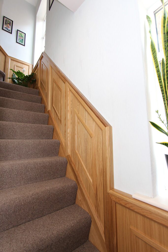 Staircase with wall panelling