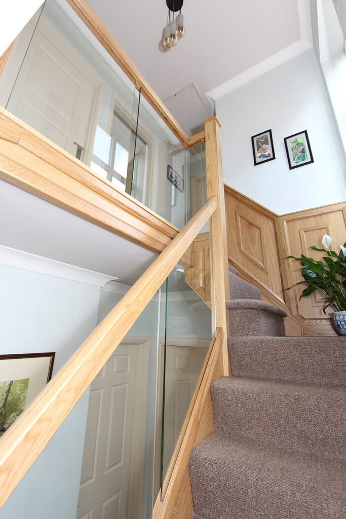 Staircase with wall panelling