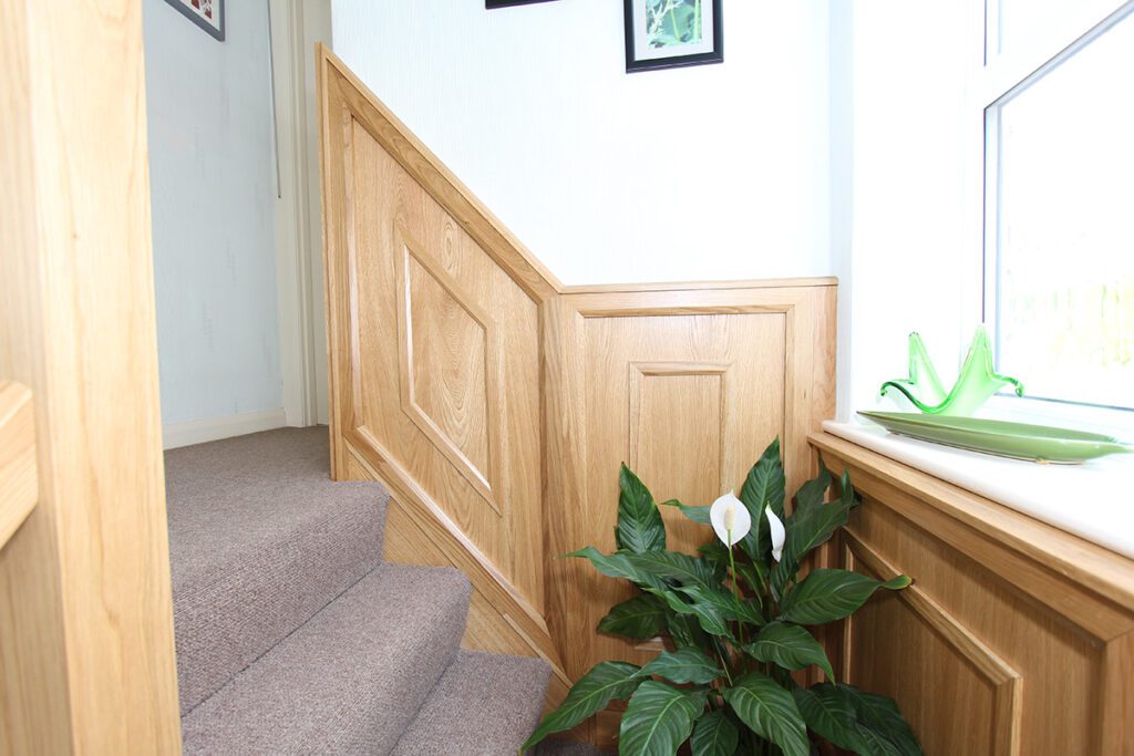 Staircase with wall panelling