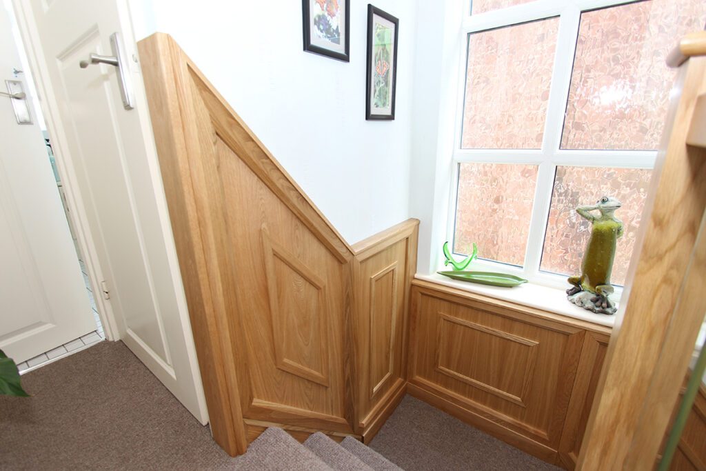 Staircase with wall panelling