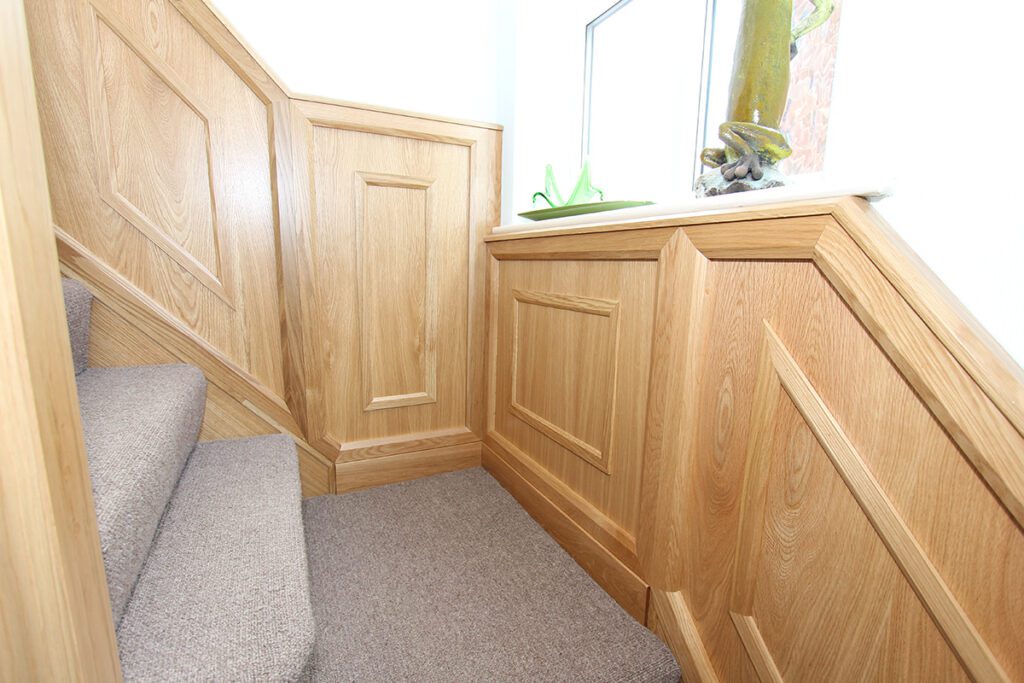 Staircase with wall panelling