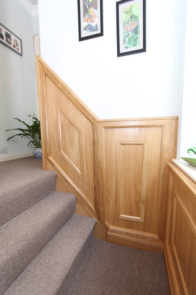 Staircase with wall panelling