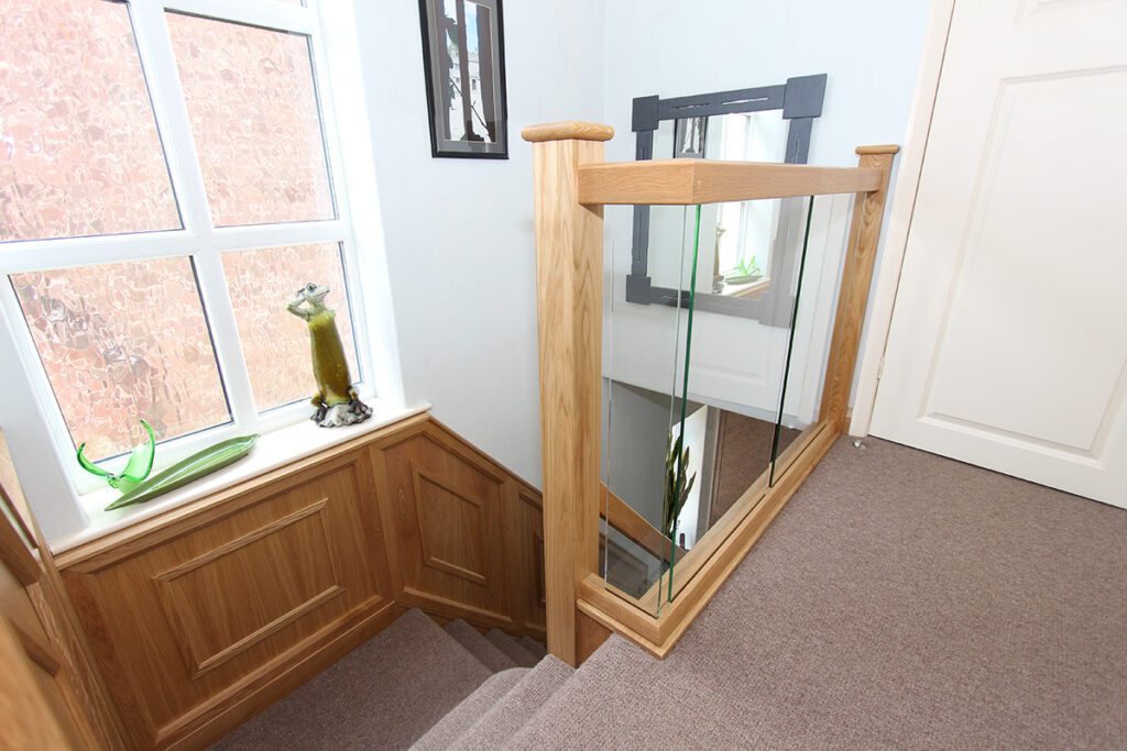 Staircase with wall panelling